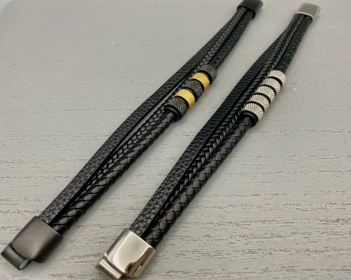 “Urban Pulse Men’s Wrist Wear Bracelet in Black and Silver, featuring a sleek design with alternating black and silver links, perfect for adding a touch of modern elegance to any outfit.”