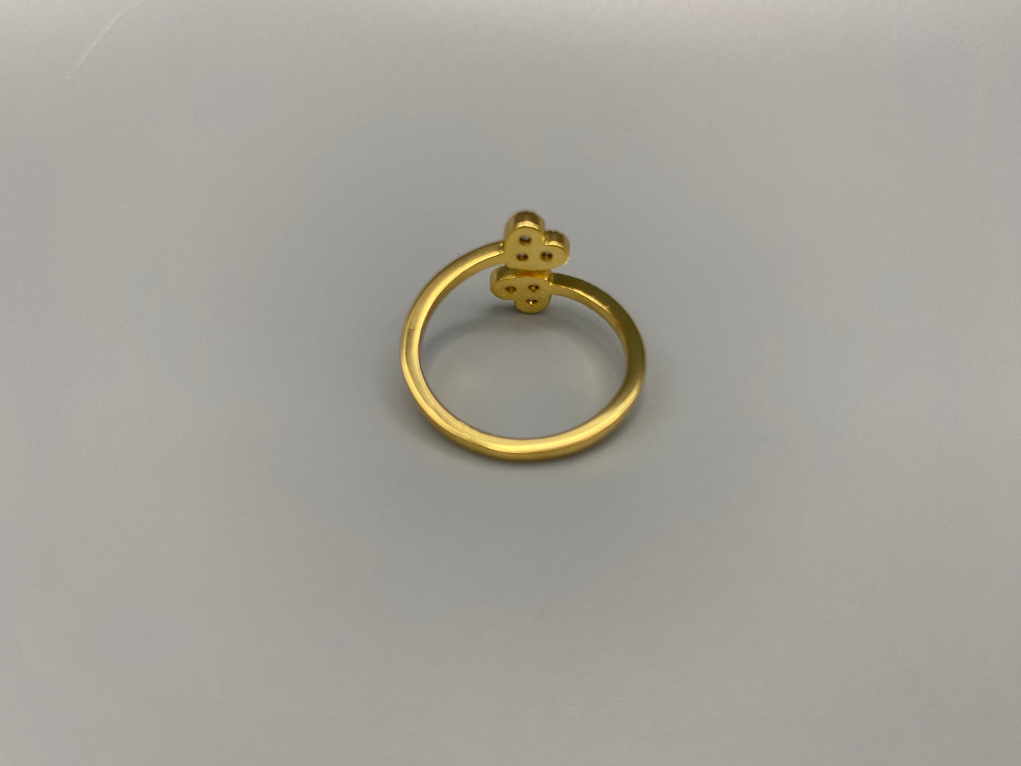 Dove Double Heart Adjustable Ring Gold: This beautiful ring features a double heart design, each adorned with sparkling zirconia stones. The elegant design, combined with 18k gold plating, creates a romantic and timeless look. The ring is non-tarnish, waterproof, nickel-free, and non-fading, ensuring it maintains its shine and is safe for sensitive skin. The adjustable size provides a comfortable fit for various finger sizes.