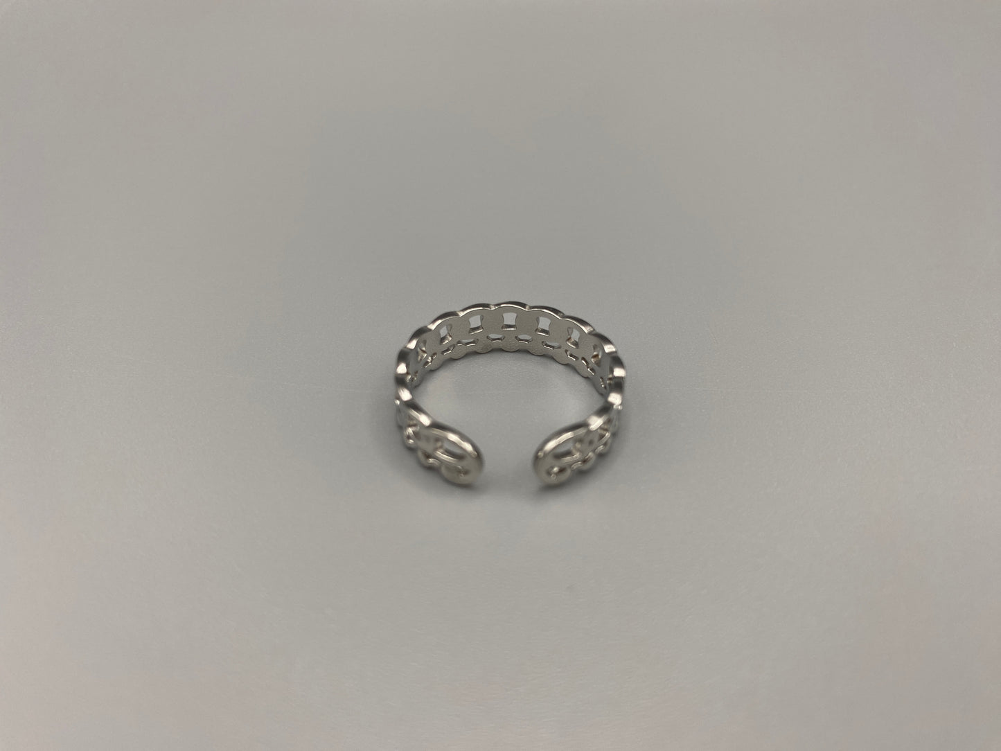 This unique ring features a dual chain design, creating an open and airy look that is both modern and elegant. The open hollow dual chain design adds a contemporary touch, while the plating ensures a luxurious finish. Made from durable titanium and stainless steel, it offers strength and longevity. Available in size 6, it provides a comfortable fit. Perfect for any occasion, this versatile accessory complements both casual and formal outfits.