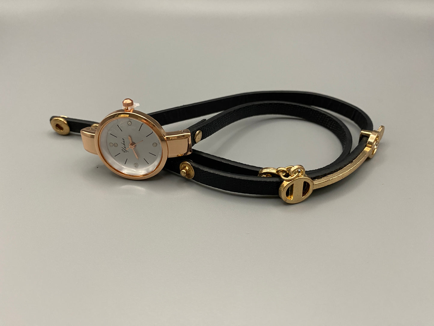 The Natasha Wristwatch Black Strap and Gold Face
