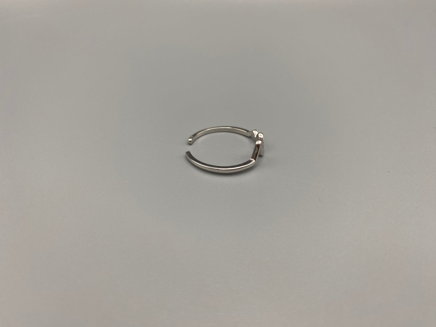 Pulse Ring Silver: This adjustable ring features a heartbeat pattern, crafted from high-quality 925 sterling silver and plated with a non-tarnish, waterproof finish. It is designed to be anti-allergy, making it perfect for any occasion, whether it’s an anniversary, engagement, wedding, or party.