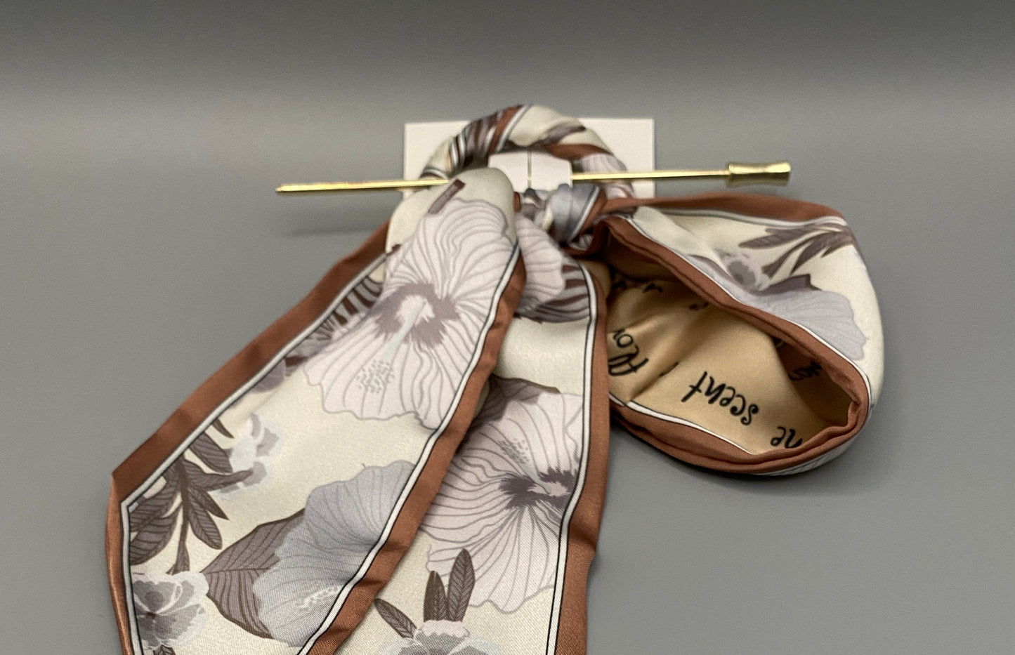 “Tessa Hair Pin Ribbon crafted from luxurious silk with a delicate floral pattern. Designed for both special occasions and everyday wear, it ensures a secure fit and adds a touch of sophistication to any hairstyle.”