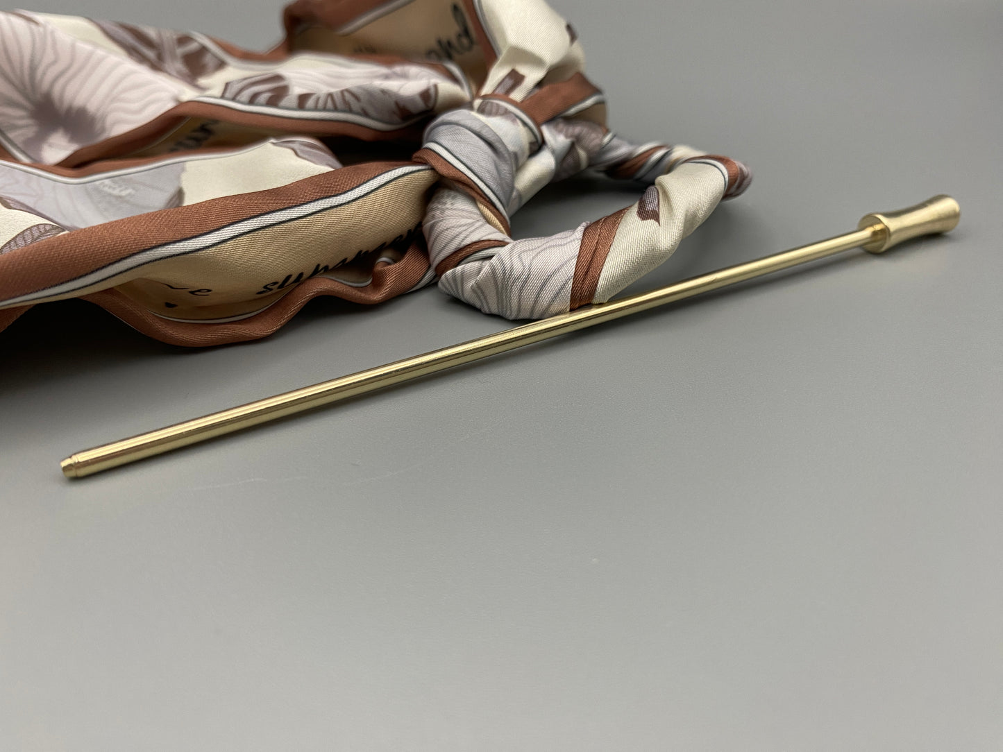 “Tessa Hair Pin Ribbon crafted from luxurious silk with a delicate floral pattern. Designed for both special occasions and everyday wear, it ensures a secure fit and adds a touch of sophistication to any hairstyle.”