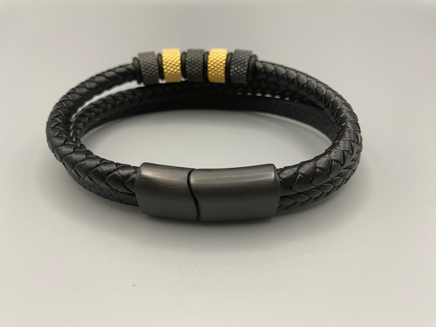 “Urban Pulse Bracelet Collection featuring leather and stainless steel bracelets, crafted with precision and elegance for the modern man, combining rugged charm with sleek sophistication.”