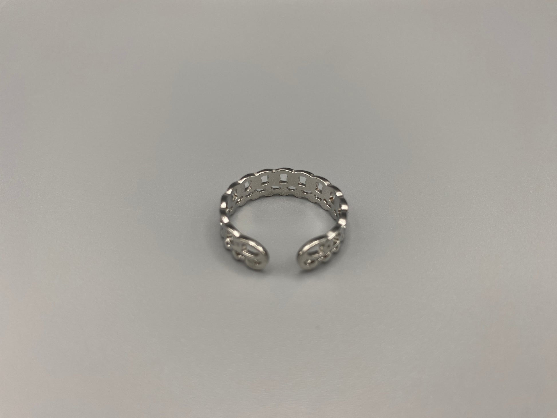 This unique ring features a dual chain design, creating an open and airy look that is both modern and elegant. The open hollow dual chain design adds a contemporary touch, while the plating ensures a luxurious finish. Made from durable titanium and stainless steel, it offers strength and longevity. Available in size 6, it provides a comfortable fit. Perfect for any occasion, this versatile accessory complements both casual and formal outfits.