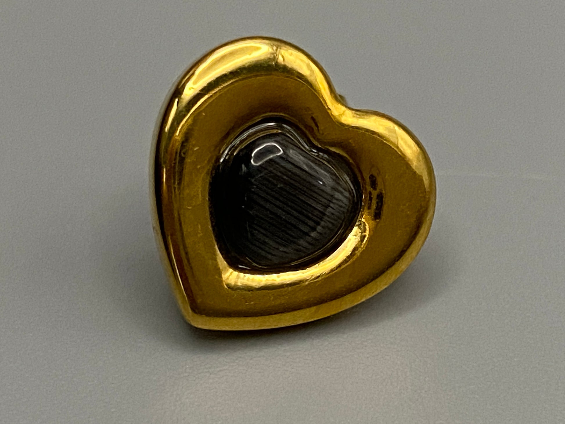 Lucia Heart Earrings Gold: Elegant and modern heart-shaped earrings featuring an obsidian stone, set in high-quality stainless steel and plated with 18K gold. Perfect for anniversaries, gifts, parties, and daily wear.”
