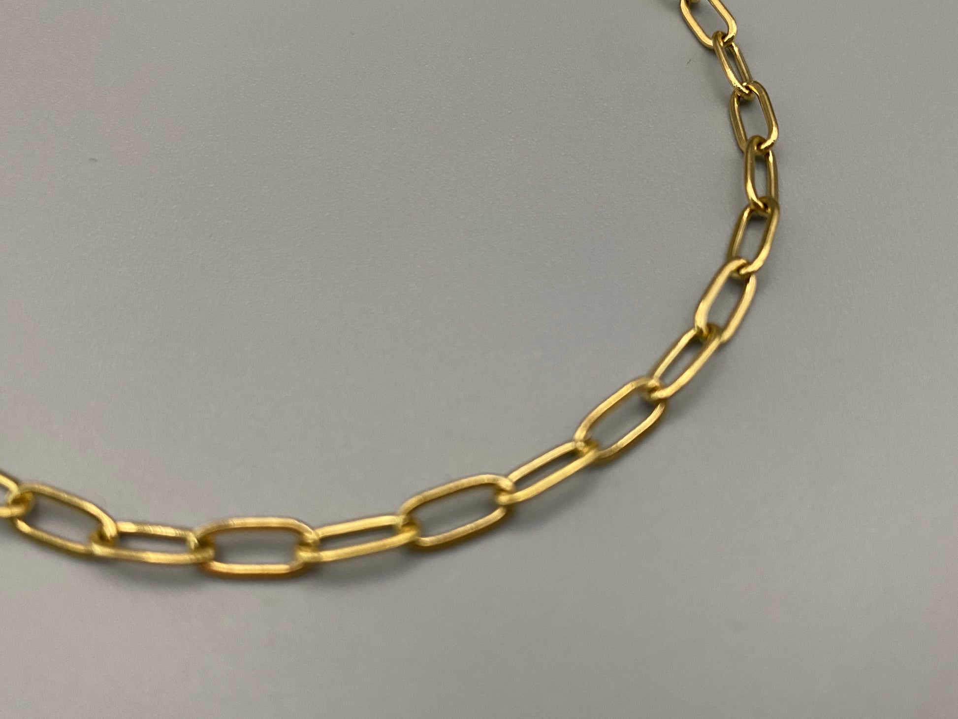  The Nexa Chain Link Bracelet is made of premium gold stainless steel with titanium steel construction and features a modern chain link design with gold PVD plating. It measures 17 cm with a 3 cm adjustment for a sleek, durable, and stylish look." elegant look."