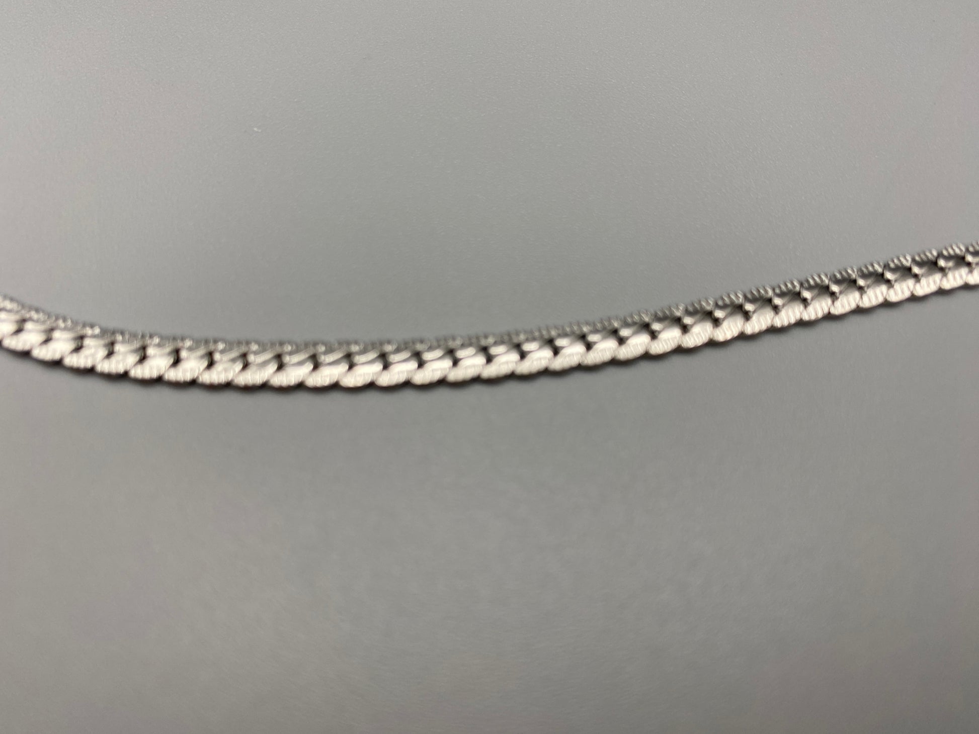 “Seraphina Bracelet in Silver with a unique snake-linked design, featuring luxurious Silver plating. Adjustable length of 17 cm with a 3 cm extension. Durable construction ensures long-lasting wear and tarnish resistance.”