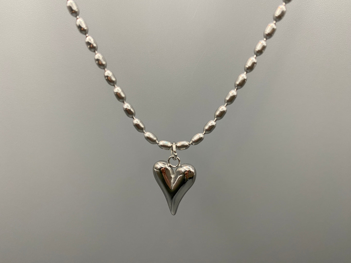 Solara Silver Heart Silver Pendant Necklace. Elegant and charming. Silver chain with a stainless steel heart pendant. Durable, polished finish. Adjustable length: 41 cm + 5 cm extension. Perfect for everyday wear and special occasions.