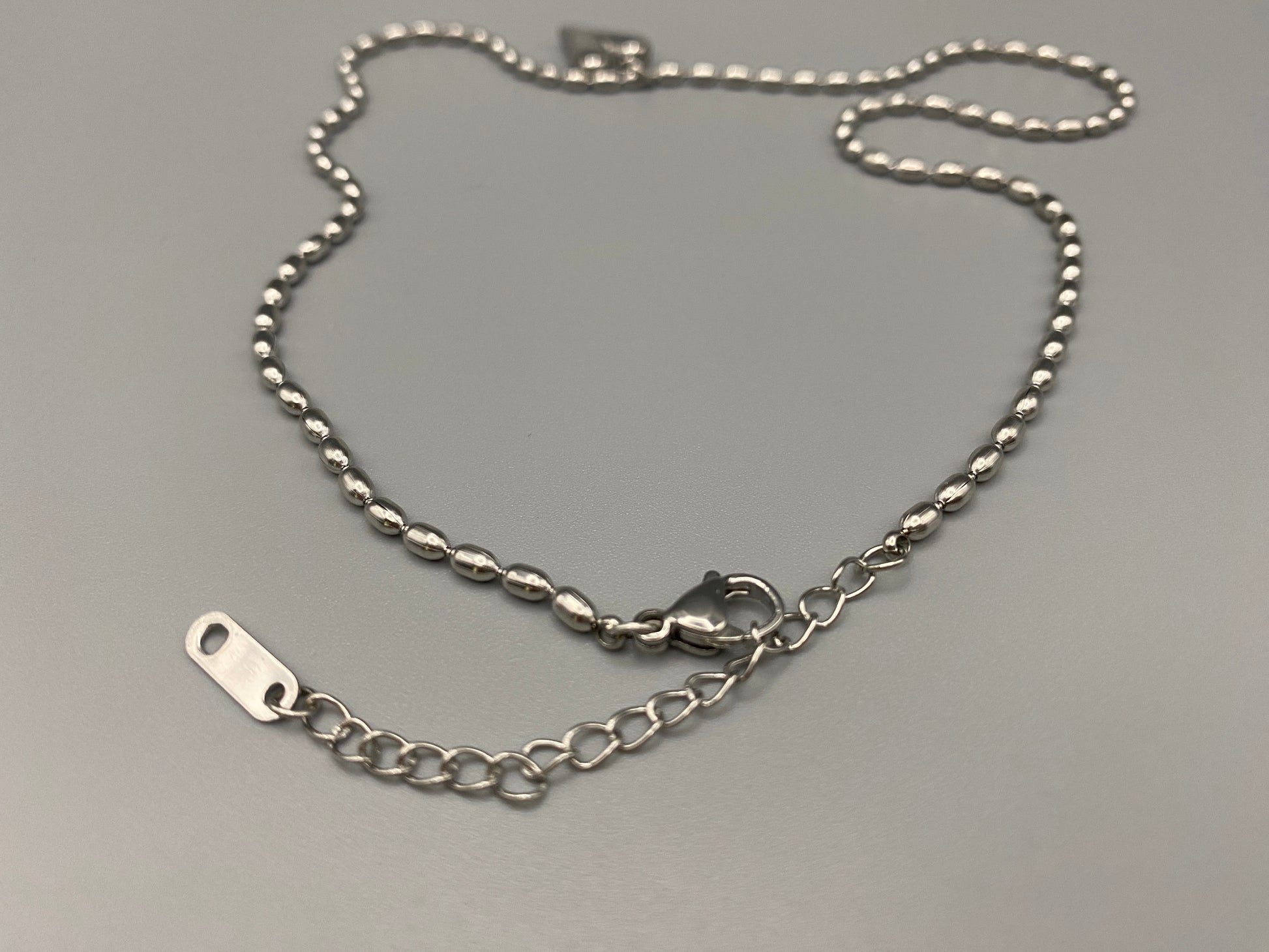 Solara Silver Heart Silver Pendant Necklace. Elegant and charming. Silver chain with a stainless steel heart pendant. Durable, polished finish. Adjustable length: 41 cm + 5 cm extension. Perfect for everyday wear and special occasions.