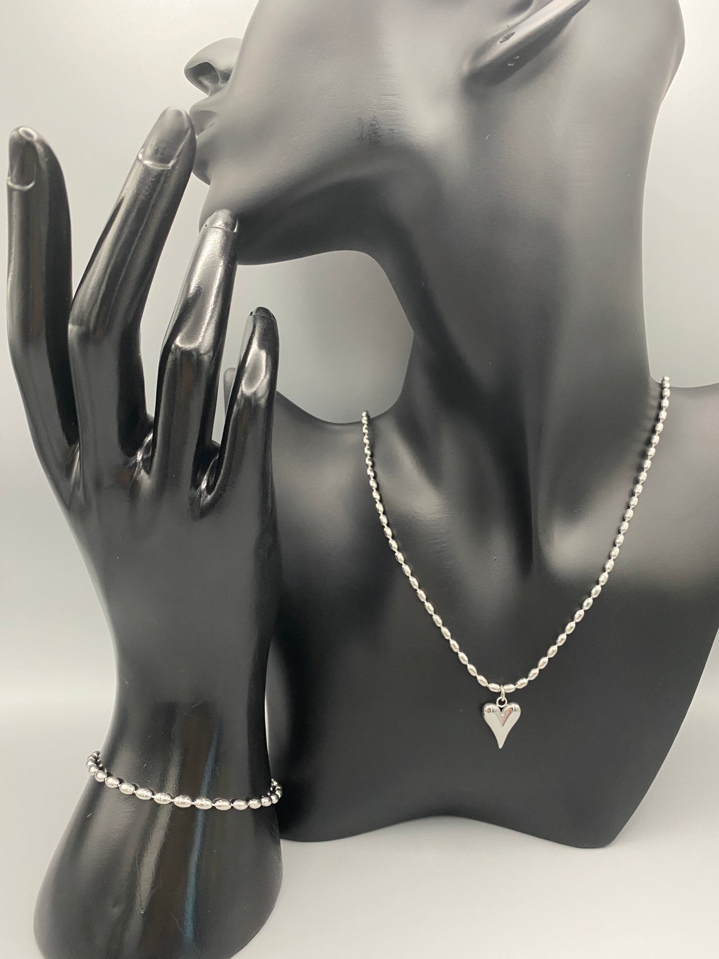 Solara Silver Heart Silver Pendant Necklace. Elegant and charming. Silver chain with a stainless steel heart pendant. Durable, polished finish. Adjustable length: 41 cm + 5 cm extension. Perfect for everyday wear and special occasions.