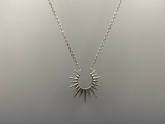 Sunburst Pendant Necklace Silver. Radiant and elegant. 18k gold plated pendant. Waterproof, non-tarnish, non-fade. Length: 45 cm + 5 cm extender. Stainless steel construction. Unique sunburst design.