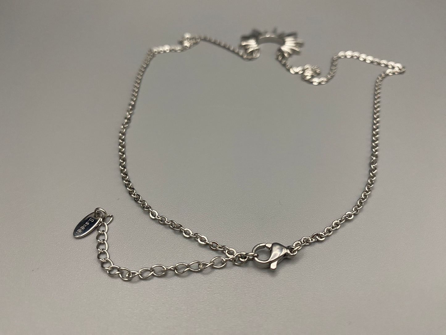 Sunburst Pendant Necklace Silver. Radiant and elegant. 18k gold plated pendant. Waterproof, non-tarnish, non-fade. Length: 45 cm + 5 cm extender. Stainless steel construction. Unique sunburst design.