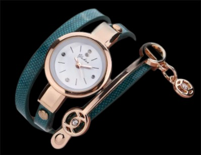 The Natasha Wristwatch Green and Gold.
A luxurious and elegant wristwatch with a black leather strap and a gold face. Features include reliable quartz movement, sparkling crystal accents on the dial, a durable 35mm alloy case, and an adjustable 24cm band with a hook buckle clasp. Note: This watch is not waterproof. Perfect for adding a touch of charm, fashion, and luxury to any outfit.