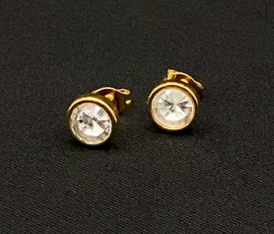 Chic stud earrings featuring dazzling AAA Zircon stones set in high-quality 304 stainless steel, gold plated, with an 8mm size and micro insert inlay technology. These earrings offer a perfect blend of elegance and durability.