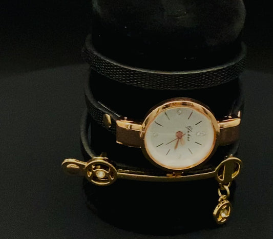 A luxurious and elegant wristwatch with a black leather strap and a gold face. Features include reliable quartz movement, sparkling crystal accents on the dial, a durable 35mm alloy case, and an adjustable 24cm band with a hook buckle clasp. Note: This watch is not waterproof. Perfect for adding a touch of charm, fashion, and luxury to any outfit.