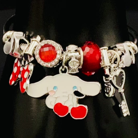 “Cartoon Character Bracelet in Red with a playful and stylish design, made from durable stainless steel, alloy charms, crystals, and glass beads. Adjustable 6cm diameter for a comfortable fit.”