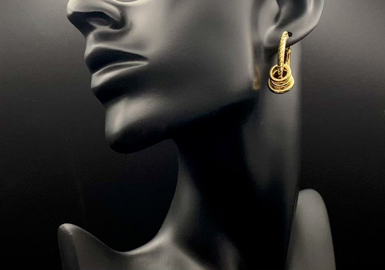 “Vespera Gold Earrings: A perfect blend of elegance and modernity, crafted from hypoallergenic 316L stainless steel and plated with luxurious 18K gold. Durable and high-quality, ideal for sensitive ears and long-lasting shine.”