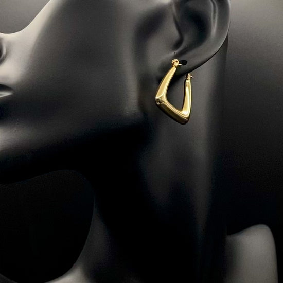Harmony Gold Earrings made from stainless steel with PVD 18k gold and titanium plating. Hypoallergenic, lead and nickel-free, perfect for sensitive skin. Featuring a trendy geometric shape and tarnish-free colour retention, these earrings blend elegance and durability.