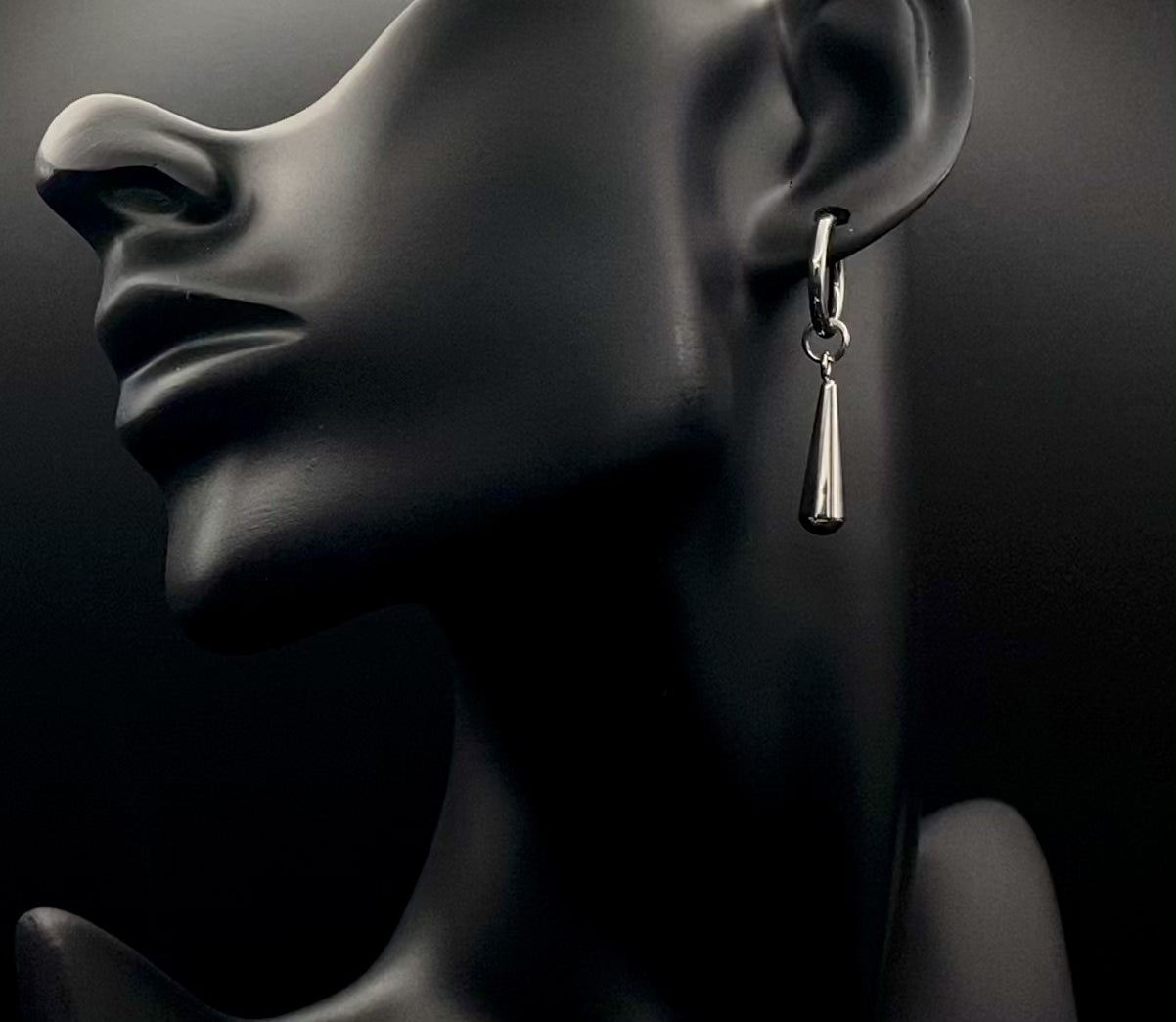 Exquisite Elysian Teardrop Dangle Earrings crafted from high-quality stainless steel and silver plated. Featuring an elegant water drop shape, these earrings offer a timeless vintage style. Ideal for special occasions, they add a touch of sophistication to any outfit. Durable and long-lasting, perfect for elevating your style with classic design and modern craftsmanship.