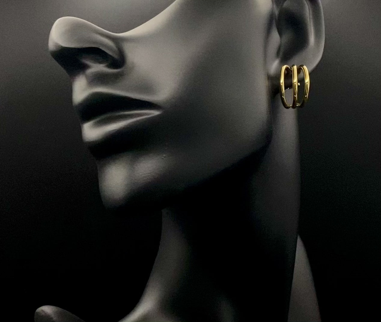 “Trinity 3 Band C Shaped Earrings Gold: A perfect blend of elegance and modern design, featuring a luxurious gold plating, unique three-band C shape, and durable construction. Ideal for both everyday wear and special occasions.”