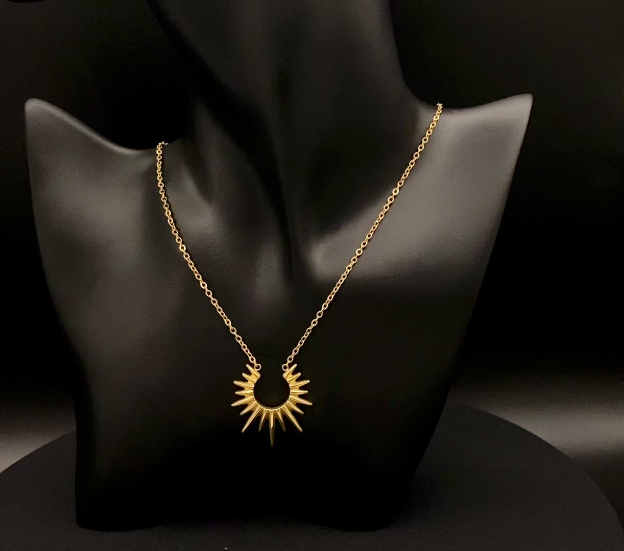 Sunburst Pendant Necklace Gold. Radiant and elegant. 18k gold plated pendant. Waterproof, non-tarnish, non-fade. Length: 45 cm + 5 cm extender. Stainless steel construction. Unique sunburst design.