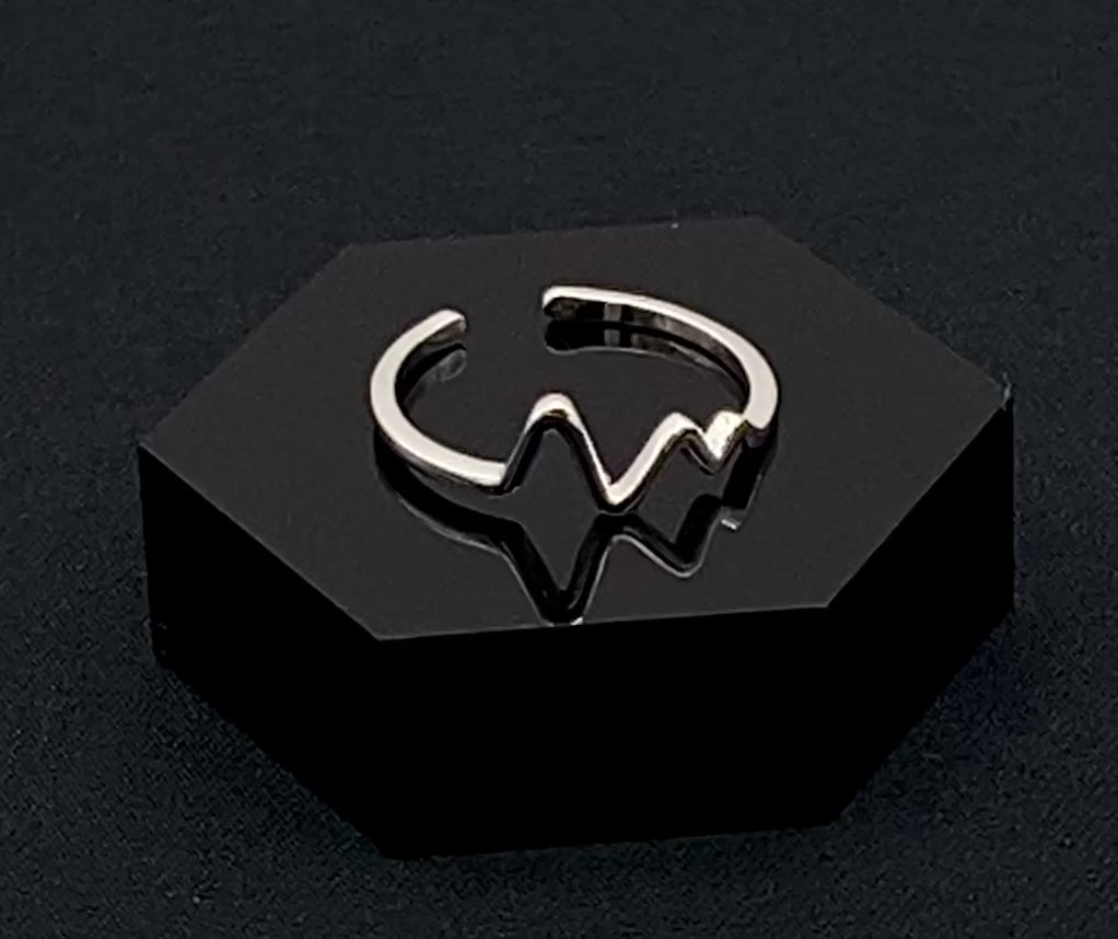 Pulse Ring Silver: This adjustable ring features a heartbeat pattern, crafted from high-quality 925 sterling silver and plated with a non-tarnish, waterproof finish. It is designed to be anti-allergy, making it perfect for any occasion, whether it’s an anniversary, engagement, wedding, or party.