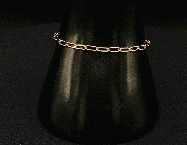 “Nexa Chain Link Bracelet in gold, crafted from premium gold stainless steel with titanium steel construction. Features a modern chain link design, gold PVD plating, and measures 17 cm with a 3 cm adjustment for a sleek, durable, and stylish look.”