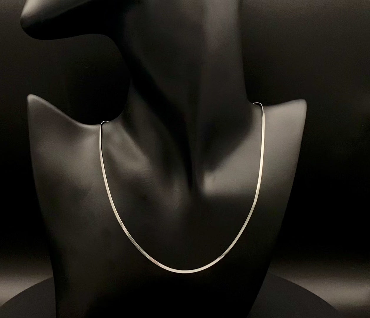 Dahlia Flat Snake Chain Silver Necklace. Sleek and sophisticated accessory. High-quality stainless steel, anti-tarnish, waterproof. Flat snake chain, 2mm width. Adjustable length: 40cm + 5cm extender. Modern and trendy design, perfect for layering or solo wear.
