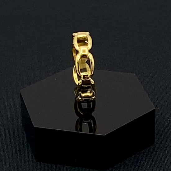 Phoebe Gold Ring: Discover the Phoebe Gold Ring, a fashionable and versatile piece perfect for any occasion. This 18K gold-plated stainless steel ring features a hollow geometric link chain design. It is resizable to size 6, making it a trendy and adaptable accessory. Ideal for daily wear or special events like anniversaries and parties, this ring is both nickel-free and lead-free, ensuring it is safe for all skin types.