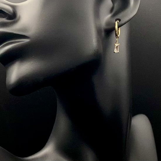 “Marilla Earrings Gold: Elegant drop earrings featuring dazzling zircon stones set in high-quality stainless steel, plated with 18K gold. Waterproof and tarnish-free, perfect for daily wear and long-lasting beauty.”