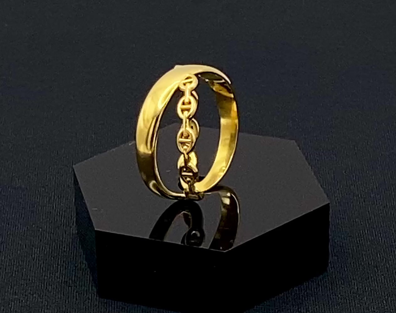 Francesca Ring Gold: A stunning piece of jewellery that combines elegance with modern design. Crafted from high-quality stainless steel and plated with gold, it features a double-layer ‘D’ shape and an adjustable band. This ring is nickel-free and lead-free, ensuring safety for sensitive skin. The channel setting adds a touch of sophistication. Perfect for gifts, anniversaries, parties, and more, the adjustable band ensures a perfect fit for any finger size, making it a versatile addition to any jewellery c