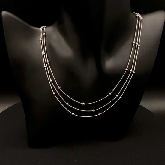 Freya Tri-Chain Bead Necklace Silver, Elegant tri-chain design with bead accents. silver plated, PVD plated for durability. Adjustable length: 40 cm + 5 cm extender. Versatile for layering or solo wear.